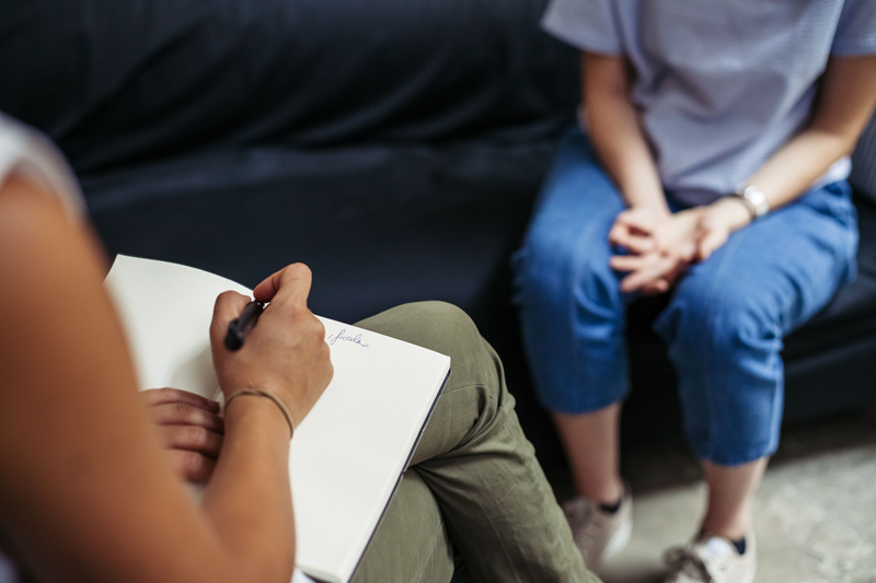 Young woman attending counseling session