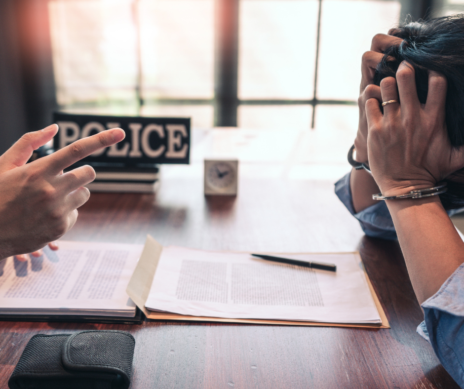 Police detective interviewing suspect