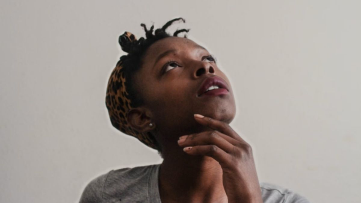 Woman reflecting quietly, illustrating psychological flexibility and learning to cope with uncertainty. Woman reflecting quietly, illustrating psychological flexibility and learning to cope with uncertainty.